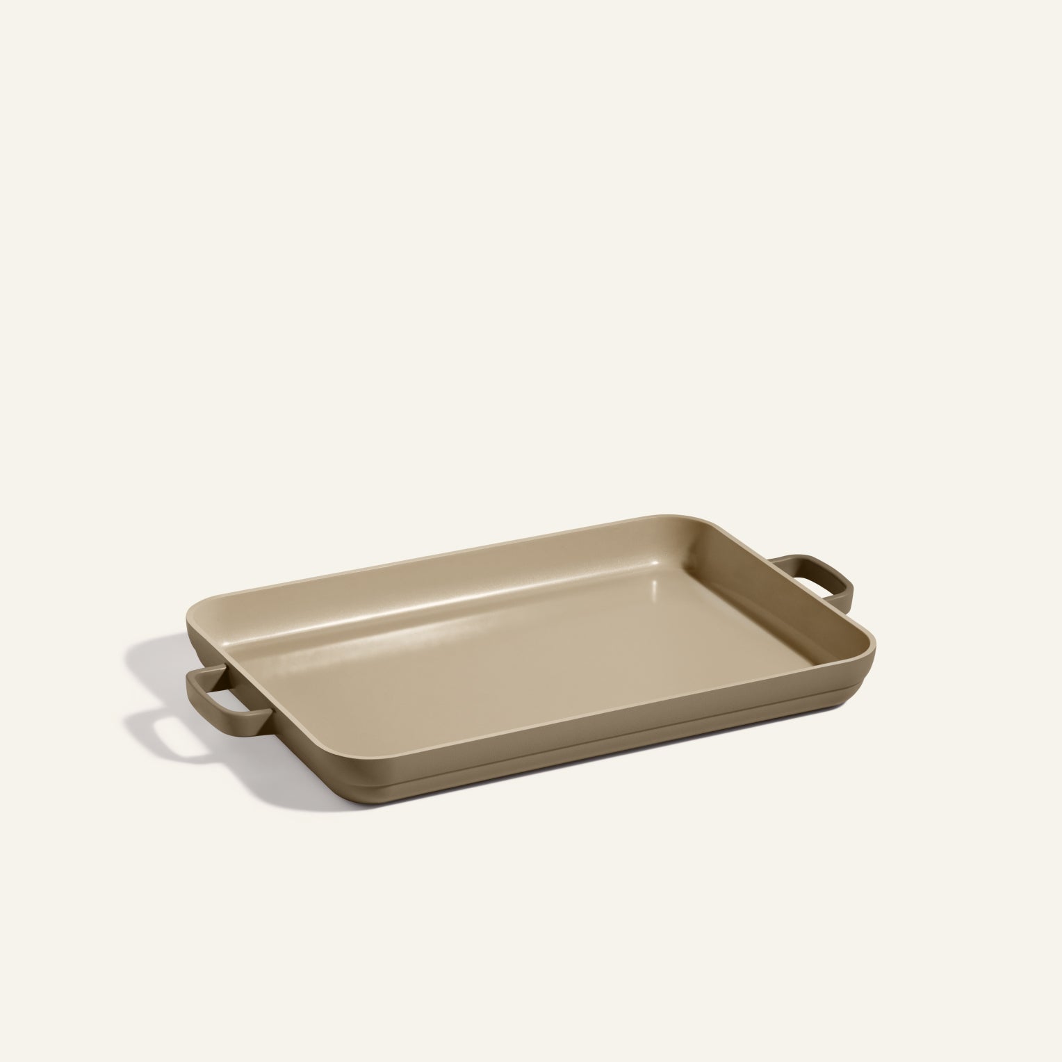 Rectangular beige baking dish with two handles, placed on a light background—perfect for pairing with your Griddle Pan or nonstick sheet pan for versatile kitchen use.