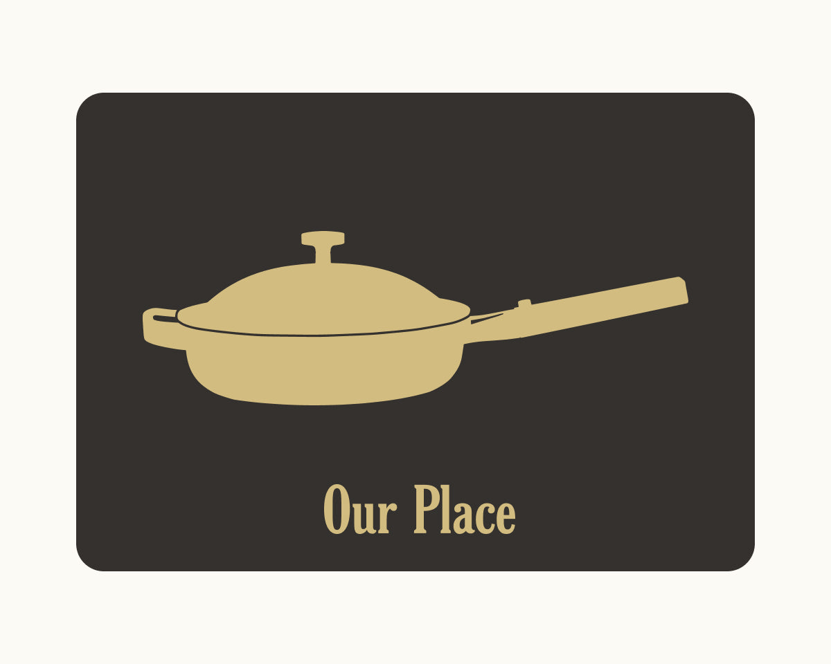 A gold silhouette of a lidded frying pan with a long handle appears above "Our Place" on a dark rectangle—perfect as an Our Place Gift Card for a thoughtful housewarming gift.