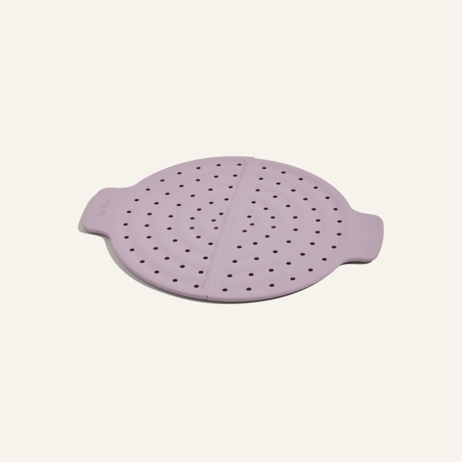 The Fearless Fry is a round, light purple silicone steamer lid with side handles and perforations, designed for the Always Pan to prevent splatter, shown on a plain light background.