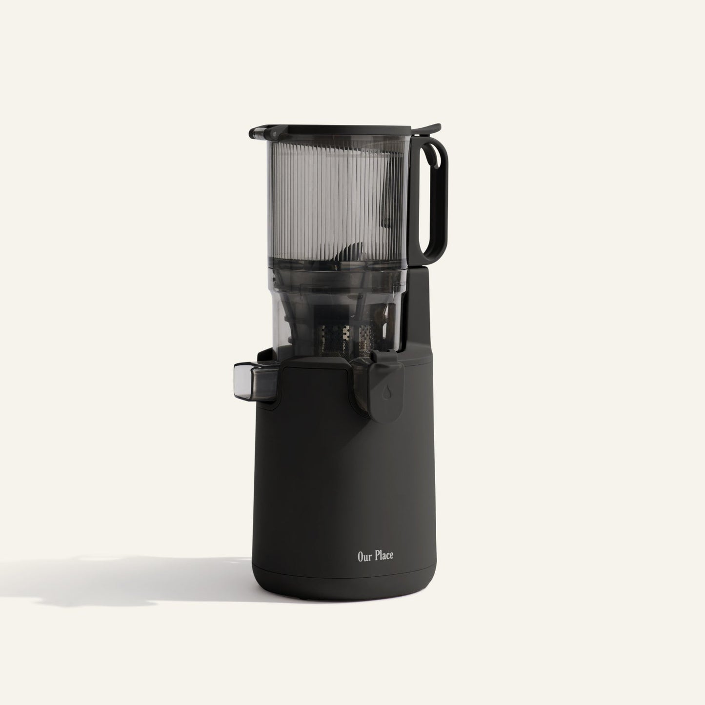 Black juicer on a white background