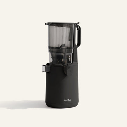 Black juicer on a white background