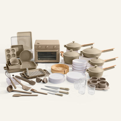Set of kitchen utensils and cookware on a white background