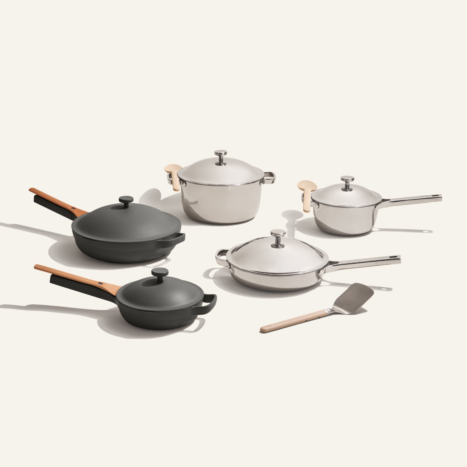 The Home Chef Set (15 piece) features two saucepans, a sauté pan, a stock pot, a frying pan, a small pot with lids, and a spatula, all arranged on a plain background.