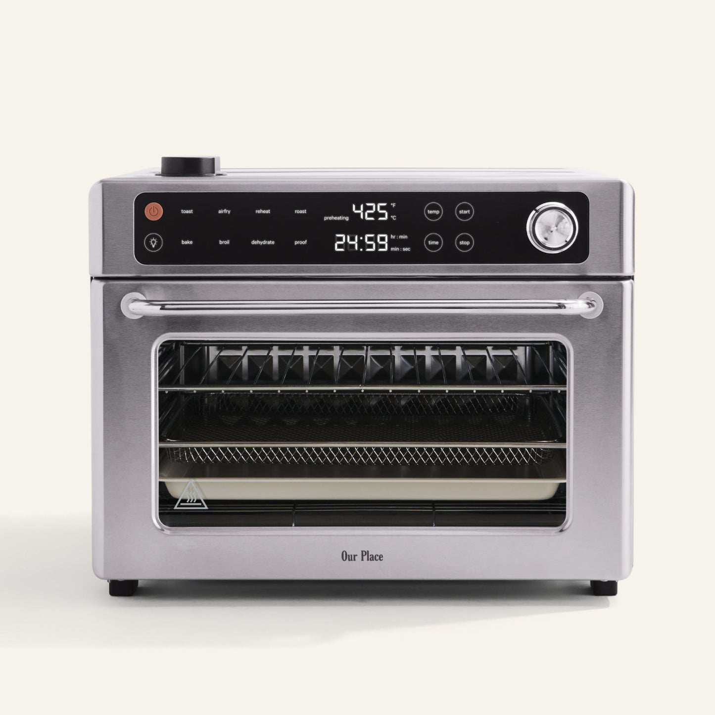 Stainless steel oven with digital display on a white background