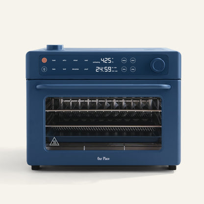 Blue oven with digital display on a white background